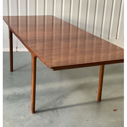 517 - MCINTOSH EXTENDING DINING TABLE, 1970's solid teak shaped rounded rectangular with two foldout hinge... 