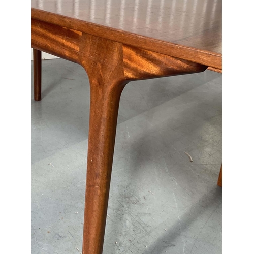 517 - MCINTOSH EXTENDING DINING TABLE, 1970's solid teak shaped rounded rectangular with two foldout hinge... 