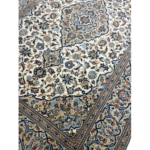 131 - PERSIAN ISPHAHAN CARPET, 294cm x 195cm.