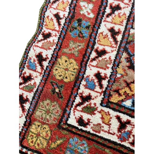 133 - ANTIQUE KAZAK RUG, 260cm x 100cm.