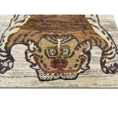 136 - TIBETAN TIGER RUG, 243cm x 170cm.