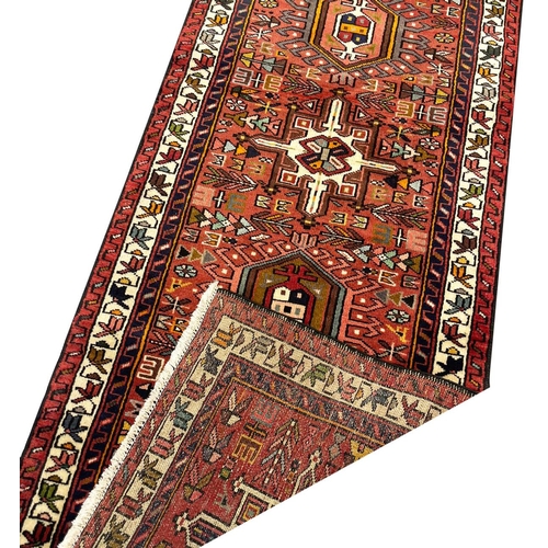 143 - PERSIAN HERIZ LONG RUNNER, 485cm x 75cm.