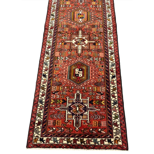 143 - PERSIAN HERIZ LONG RUNNER, 485cm x 75cm.