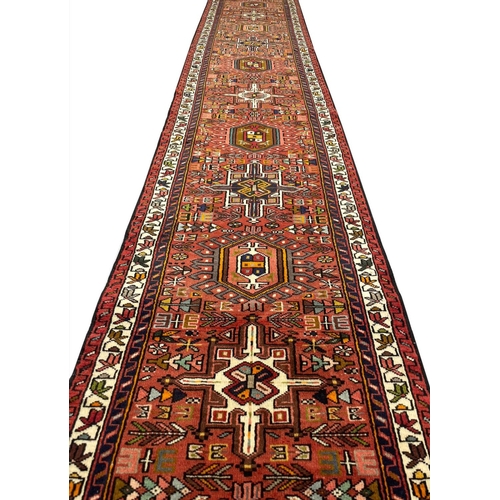 143 - PERSIAN HERIZ LONG RUNNER, 485cm x 75cm.