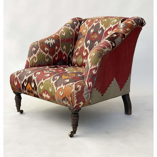 190 - KELIM ARMCHAIR, Victorian with antique upholstery and turned front supports, 69cm W.