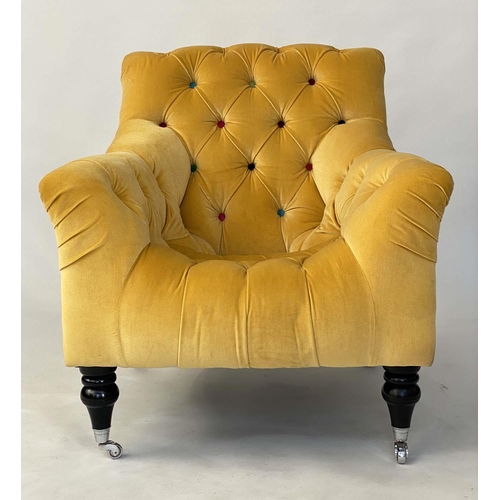 200 - ARMCHAIR, primrose yellow velvet upholstered with deep multi colour buttoned seat, back and arms, 72... 