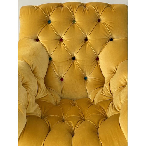 200 - ARMCHAIR, primrose yellow velvet upholstered with deep multi colour buttoned seat, back and arms, 72... 