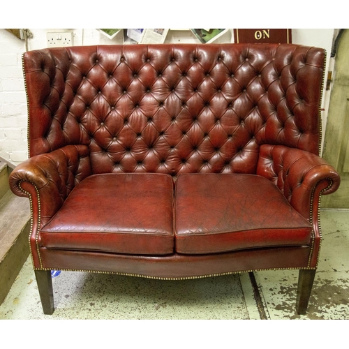 459 - WING SOFA, 113cm H x 140cm, Georgian style in old red leather.