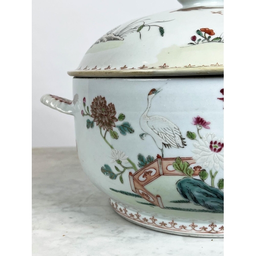 6 - CHINESE EXPORT SOUP TUREEN, 19th century famille rose, decorated with cranes in garden scenes.