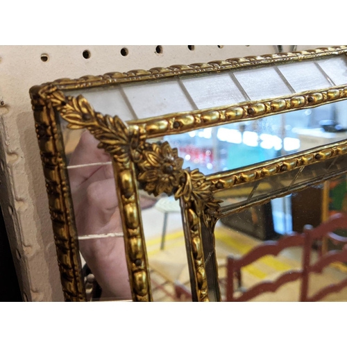 170 - CUSHION MIRRORS, a pair, each 32cm D x 46cm H, with decorative brass detail. (2)