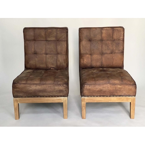 210 - COCKTAIL CHAIRS, a pair, Timothy Oulton style square buttoned tan leather, 63cm W. (2)