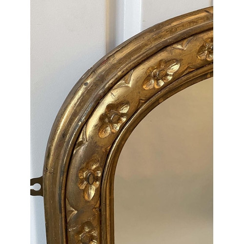 218 - OVERMANTEL MIRROR, late 19th century English carved giltwood with arched moulded frame and recessed ... 