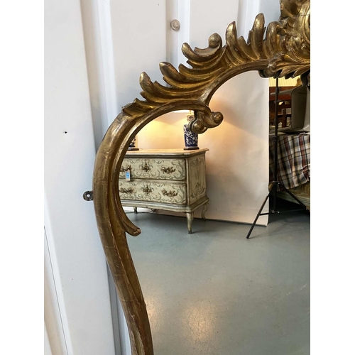 215 - OVERMANTEL MIRROR, 19th century carved giltwood with 'C' scroll crest and foliage floral frame of wa... 