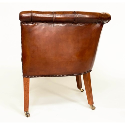 283 - DESK ARMCHAIR, Edwardian tan leather studded with rounded back and square tapering supports with cas... 