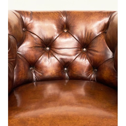 283 - DESK ARMCHAIR, Edwardian tan leather studded with rounded back and square tapering supports with cas... 