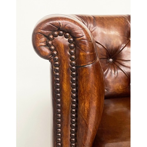 283 - DESK ARMCHAIR, Edwardian tan leather studded with rounded back and square tapering supports with cas... 