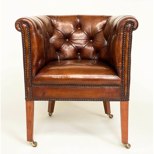 283 - DESK ARMCHAIR, Edwardian tan leather studded with rounded back and square tapering supports with cas... 