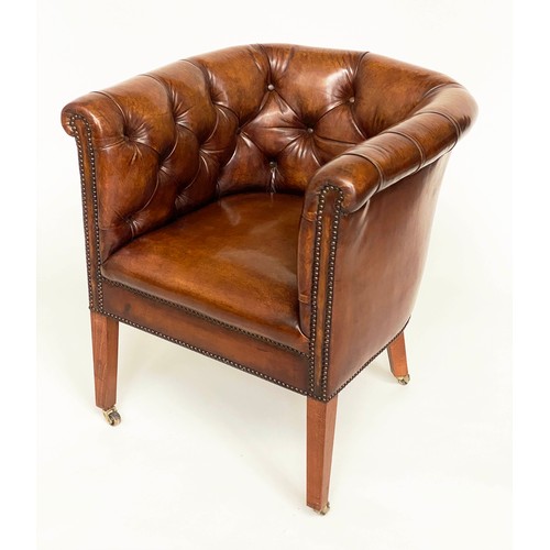 283 - DESK ARMCHAIR, Edwardian tan leather studded with rounded back and square tapering supports with cas... 