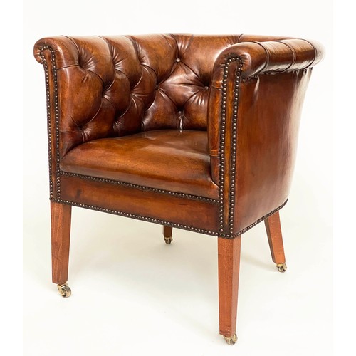 283 - DESK ARMCHAIR, Edwardian tan leather studded with rounded back and square tapering supports with cas... 