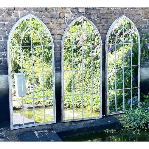 552 - ARCHITECTURAL GARDEN MIRRORS, 160cm H x 67cm W, set of three, aged arched metal frames. (3)