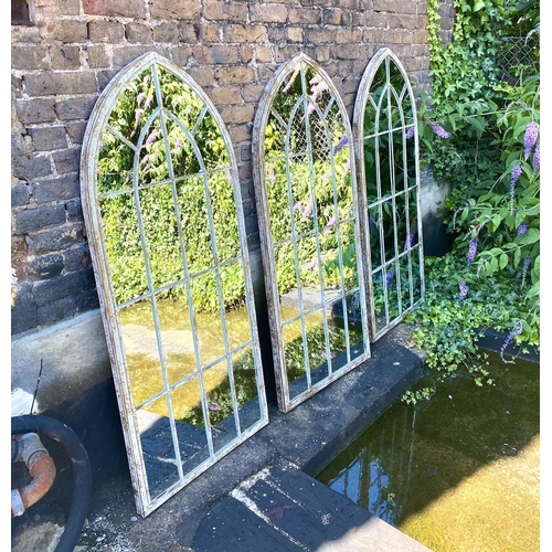 552 - ARCHITECTURAL GARDEN MIRRORS, 160cm H x 67cm W, set of three, aged arched metal frames. (3)