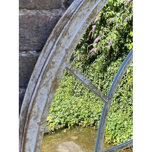 552 - ARCHITECTURAL GARDEN MIRRORS, 160cm H x 67cm W, set of three, aged arched metal frames. (3)