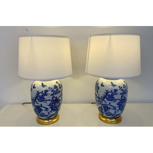 411 - TABLE LAMPS, a pair, Chinese export style blue and white ceramic, with shades. (2)