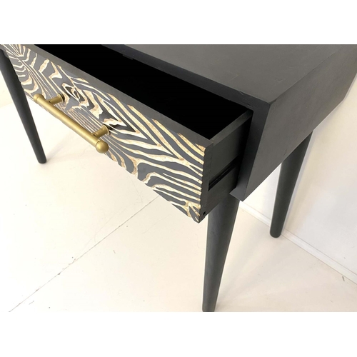 424 - CONSOLE TABLE, 76cm H x 111cm W x 44cm D, ebonized with zebra print accents to drawers.