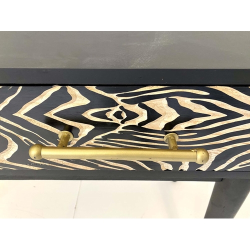 424 - CONSOLE TABLE, 76cm H x 111cm W x 44cm D, ebonized with zebra print accents to drawers.