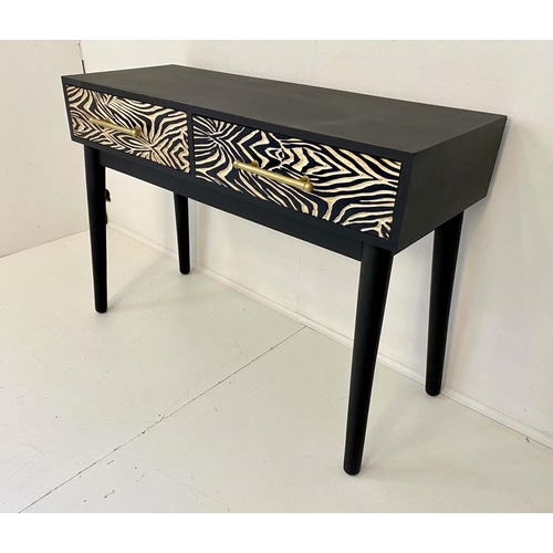 424 - CONSOLE TABLE, 76cm H x 111cm W x 44cm D, ebonized with zebra print accents to drawers.