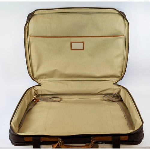 3 - LOUIS VUITTON SATELLITE 70 SUITCASE, monogram canvas and leather, brass hardware, double buckle fast... 