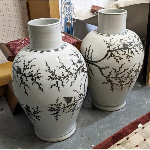 21 - PAOLO MOSCHINO YUAN DYNASTY KWANYIN VASES, a pair, with magpie on tree design, 72cm H. (2)