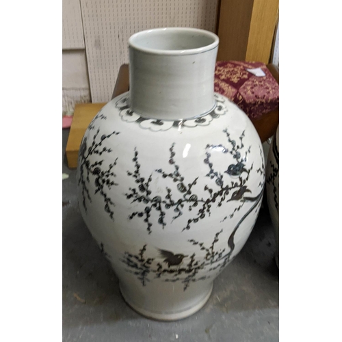 21 - PAOLO MOSCHINO YUAN DYNASTY KWANYIN VASES, a pair, with magpie on tree design, 72cm H. (2)