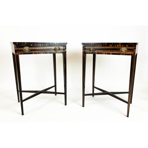 554 - SIDE TABLES, a pair, George III manner, coromandel with crossbanded tops and drawers, on slender tap... 