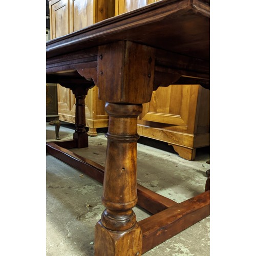 555 - FARMHOUSE DINING TABLE, walnut in the 17th century manner, 213cm L x 90cm W x 74cm H.