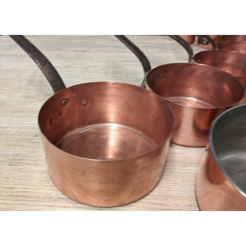 1 - BATTERIE DE CUISINE, comprising of a set of five graduated copper pans, the largest 20cm diam anothe... 
