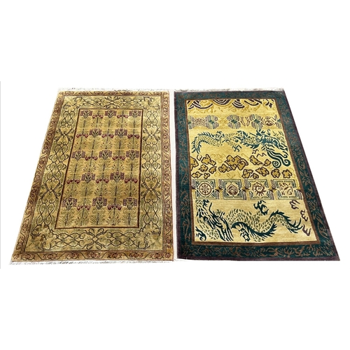 110 - TIBETAN RUGS, two, to include a dragon design rug 185cm x 121cm and one other 185cm x 124cm. (2)