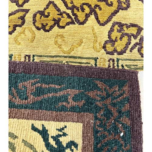 110 - TIBETAN RUGS, two, to include a dragon design rug 185cm x 121cm and one other 185cm x 124cm. (2)