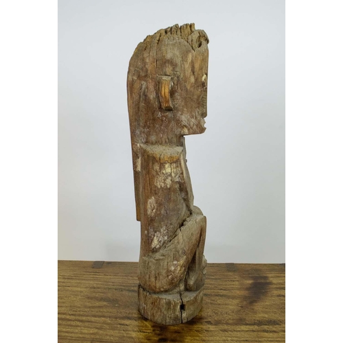 17 - GUARDIAN FIGURE, probably Nepalese, carved wood or Leti tribe Indonesia, 82cm H.