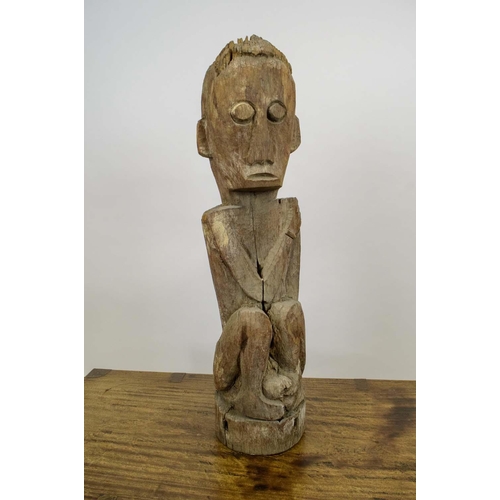 17 - GUARDIAN FIGURE, probably Nepalese, carved wood or Leti tribe Indonesia, 82cm H.