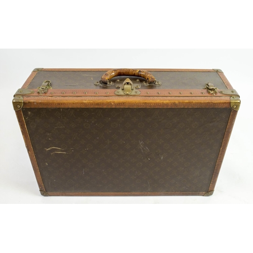 27 - LOUIS VUITTON SUITCASE, early 20th century leather trim and brass hardware with classic monogrammed ... 