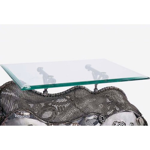 502 - RHINO DRINKS TABLE, 145cm x 46cm x 69cm, glass top, figural base.