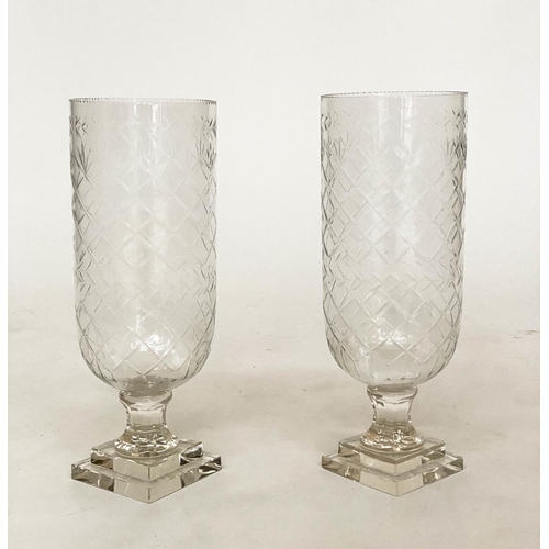 119 - STORM LANTERNS, a pair, hand cut glass, cylindrical engraved with facetted stepped plinth bases, 45c... 