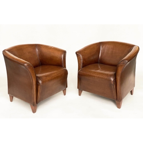 122 - ARMCHAIRS, a pair, mid brown tan leather with outswept arms and splay supports, 76cm W. (2)