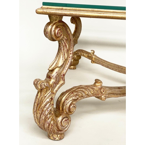 127 - GILTWOOD LOW CENTRE TABLE, hand carved giltwood, with scroll carved supports and wavy stretcher, 116... 