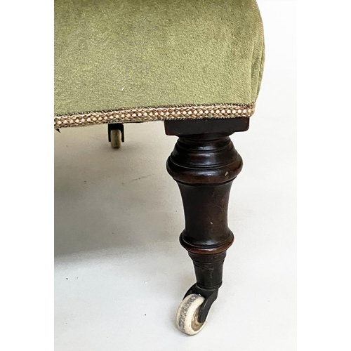 128 - ARMCHAIR, Victorian, moss green velvet upholstered with arched buttoned back and turned supports, 72... 