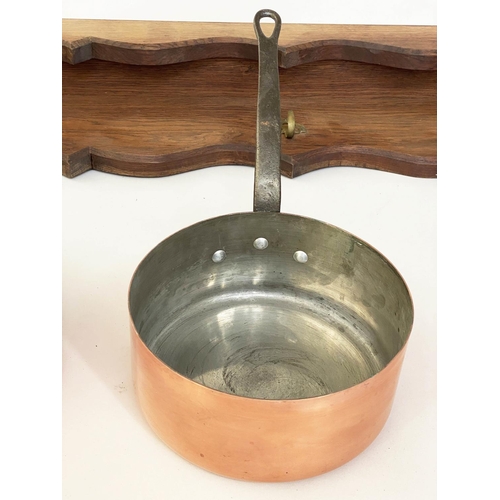 136 - BATTERIE DE CUISINE, copper pans, a set of five graduated pots with stand, largest, 26cm W. (6)