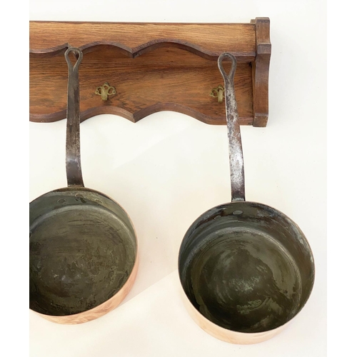 136 - BATTERIE DE CUISINE, copper pans, a set of five graduated pots with stand, largest, 26cm W. (6)