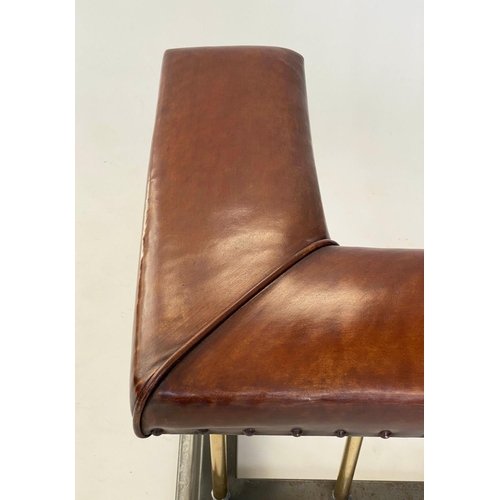 547 - CLUB FENDER, early 20th century studded tan leather continuous seat raised upon brass balustrade sup... 