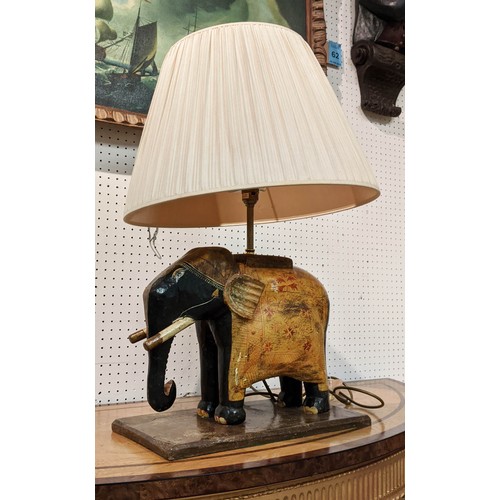 14 - ELEPHANT TABLE LAMP, base 41cm x 63cm H, 33cm H Indian painted and carved wood, with shade.